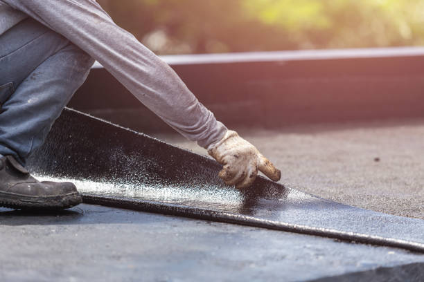 Professional Waterproofing technician working in Crystal, MI